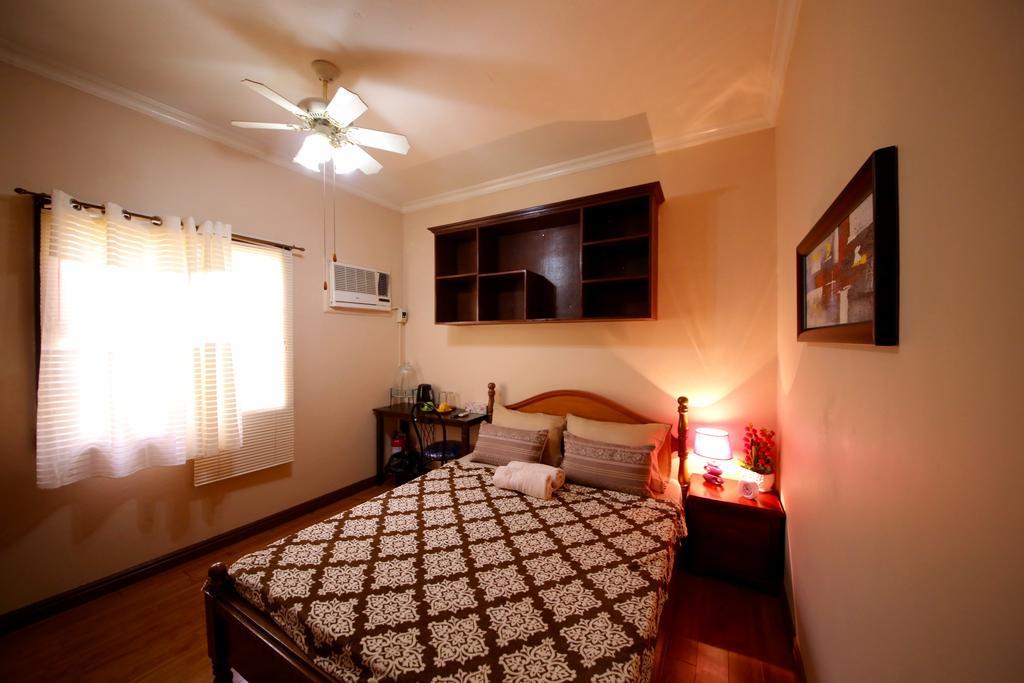 Dee Guesthouse White Sands Île de Mactan Extérieur photo